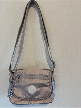 Kipling Metallic Messenger purse